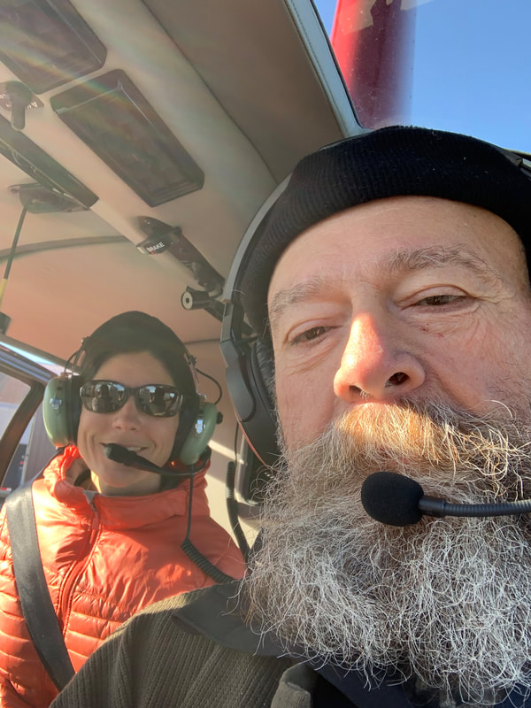 Father and daughter enjoying their flight on the Wind River Mountain Escape scenic heli-tour from Pinedale, WY! Photo credit Harold Kelley