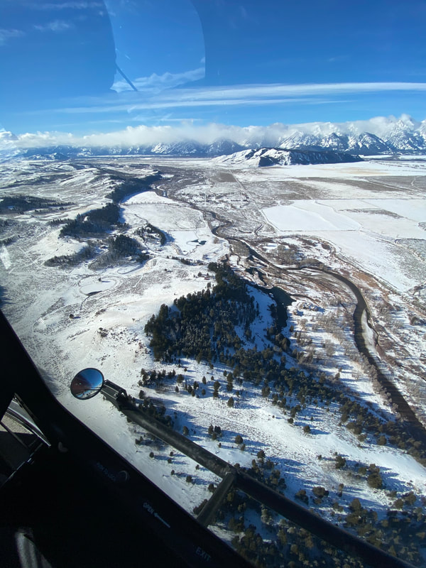 Gros Ventre River north of Jackson, WY with the Teton Mountain Range in the background from WRA's heli. Photo credit E. Wittbrodt